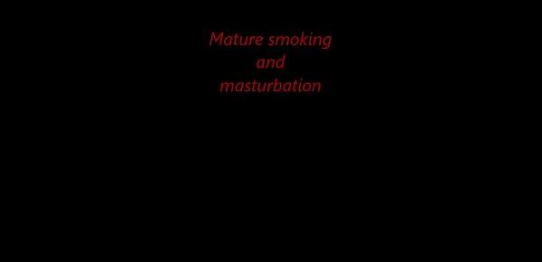  Mature woman smoking and masturbating